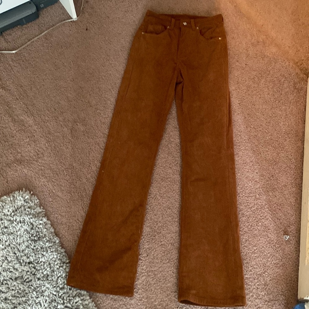 Brown corduroy flare pants.